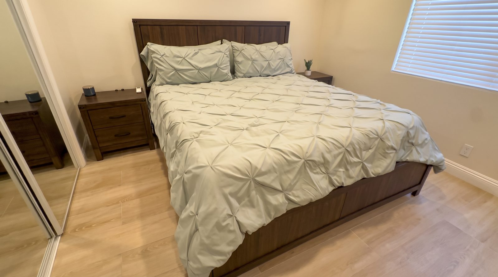 Furnished bedroom at Her Aria women's recovery residence in Los Angeles and San Bernardino Counties